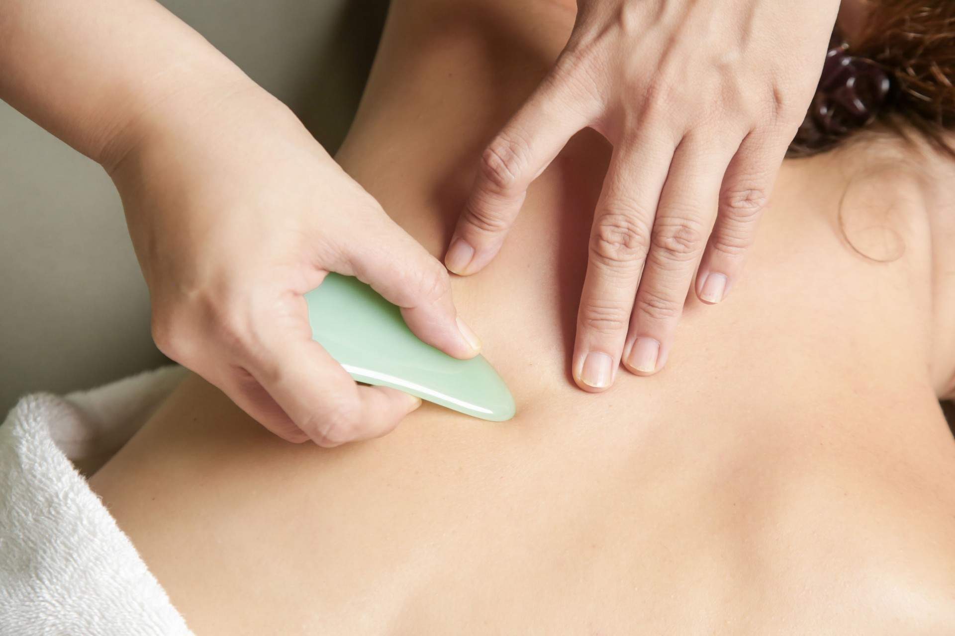 Gua Sha massage therapy for pain relief and circulation at Avy Spa Palo Alto